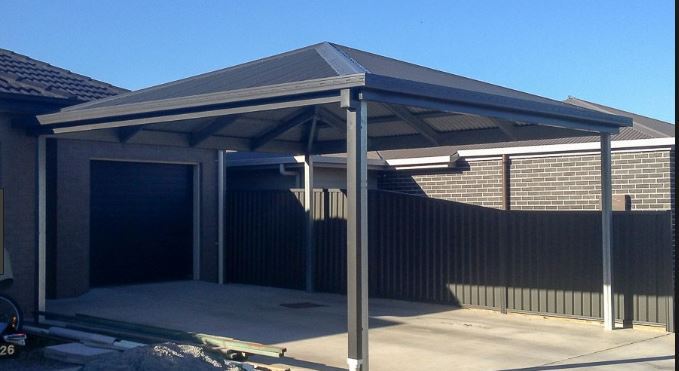Open on all sides carport in a black colorbond material