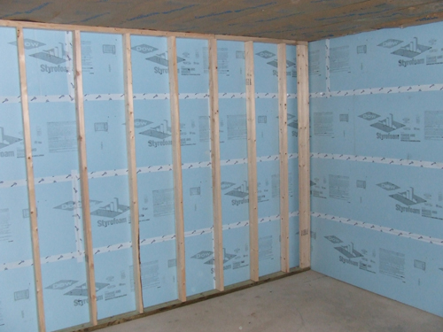 Framed Stud Wall In Front of Foam Board Basement Wall Insulation